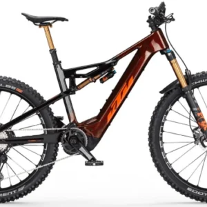 KTM MACINA KAPOHO PRESTIGE 43 cm '23 electric mountain bike riding on a steep trail in Europe