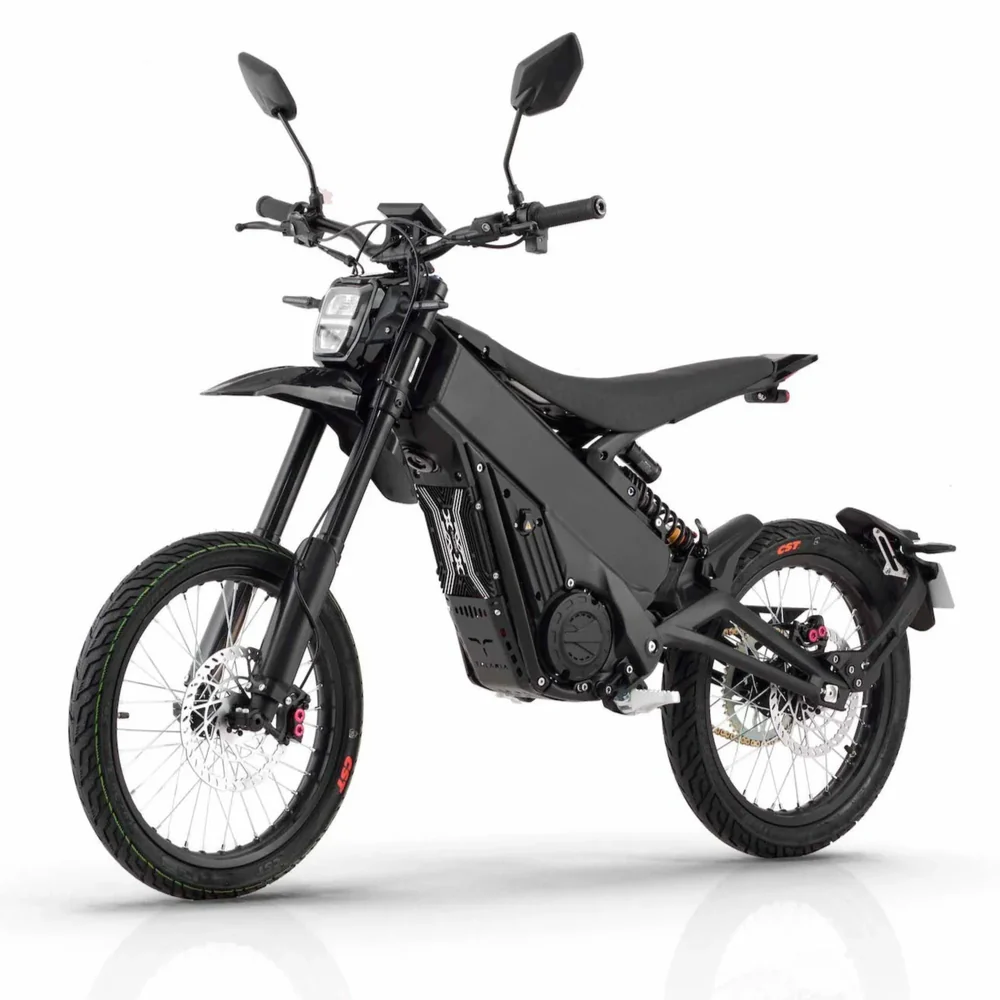 Talaria X3 Pro 5kw Electric Bike transitioning from urban street to a light off-road trail in Europe.