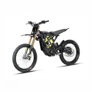 Sur Ron Light Bee-X electric dirt bike rider navigating a challenging forest trail in Europe.