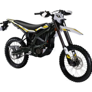 Dynamic shot of the Sur Ron Ultra Bee T & R (Road Legal) electric motorcycle navigating a winding European road, showcasing its integrated LED lighting, mirrors, and dual-sport tires.